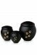 Black pet urn with gold coloured paws
