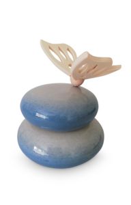 Handmade baby cremation urn with wooden butterfly