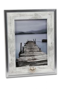 Photo frame with small heart for cremation ashes