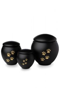 Black pet urn with gold coloured paws