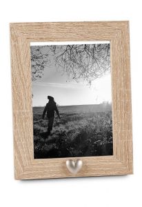 Photo frame with small heart for cremation ashes