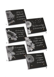 Memorial stone with several flower themes