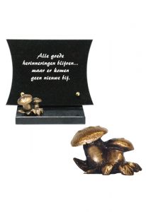 Memorial stone with bronze toadstools