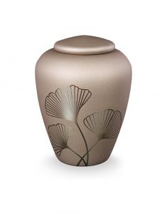 Glass cremation urn with ginkgo leaves - symbol of strength and wisdom