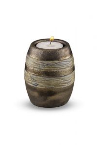 Ceramic keepsake cremation ashes urn with a candle