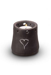 Ceramic keepsake cremation ashes urn with a candle