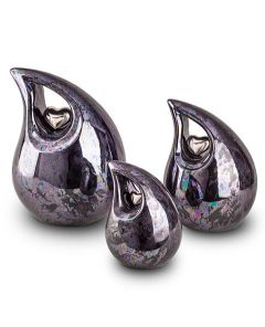 Ceramic keepsake cremation ashes urn with silver heart