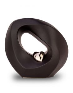 Matte black ceramic cremation urn with silver heart 'Infinity'