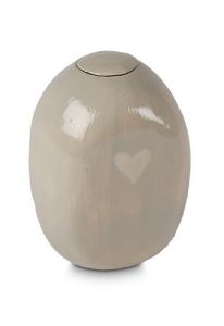Ceramic keepsake urn with little heart light green