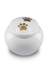 pet urn for ashes white with 2 gold-colored paw prints in various sizes