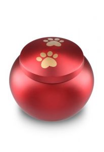 pet urn for ashes matte red with 2 gold-colored paw prints in various sizes